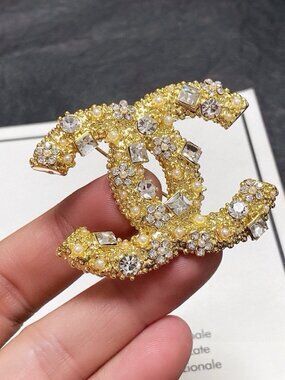 Chanel brooches